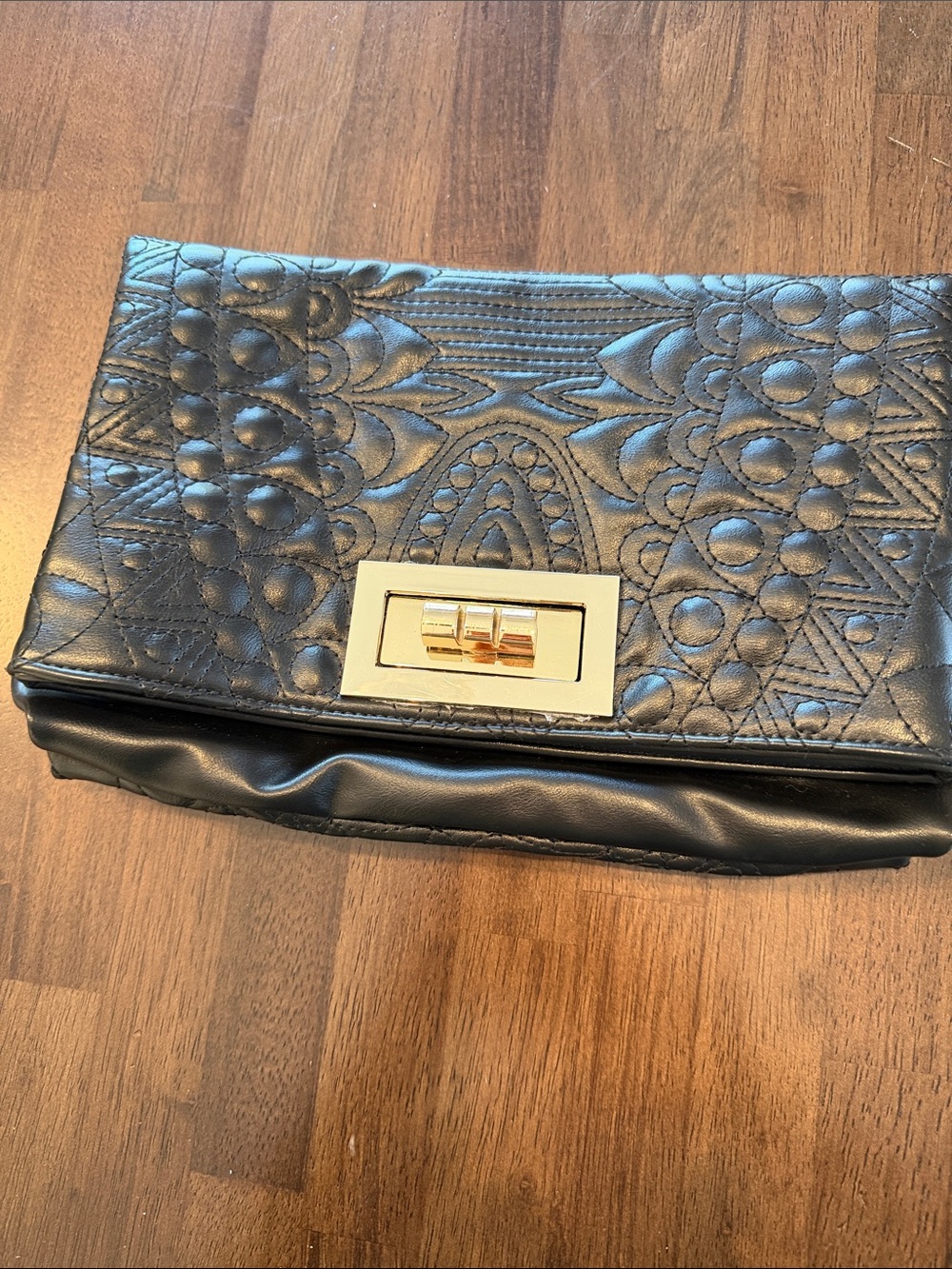 Black Quilted Leather Fold-Over Clutch with Gold Turn-Lock
